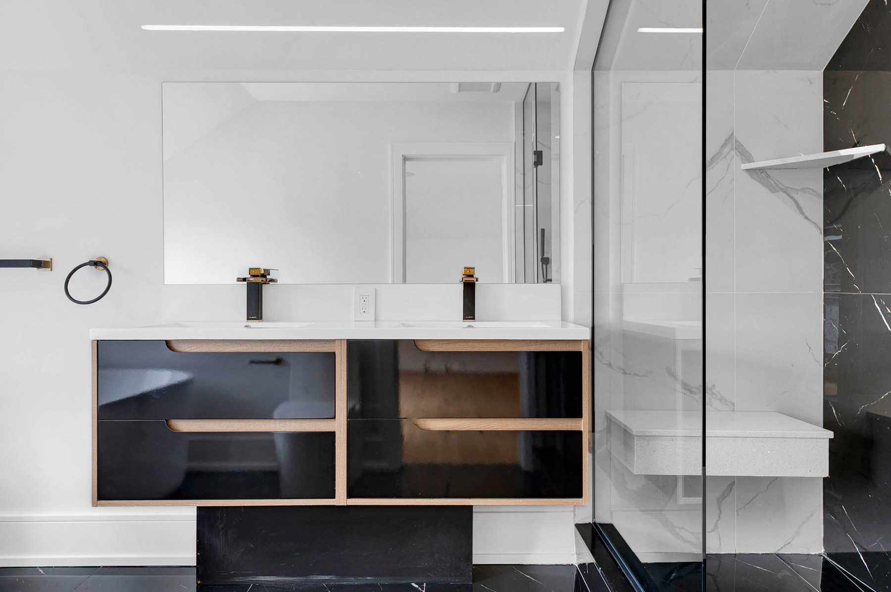 Modern bathroom with floating vanity inside a completed Toronto laneway home